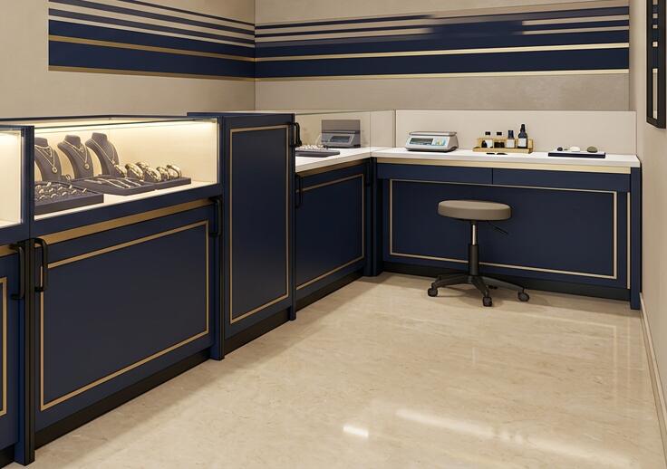 Design rendering of lit jewelry cases beside a testing counter with scales.